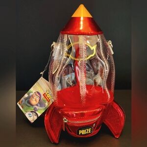 *Collectors Item* Toy Story clear Pizza Planet spaceship claw machine crossbody